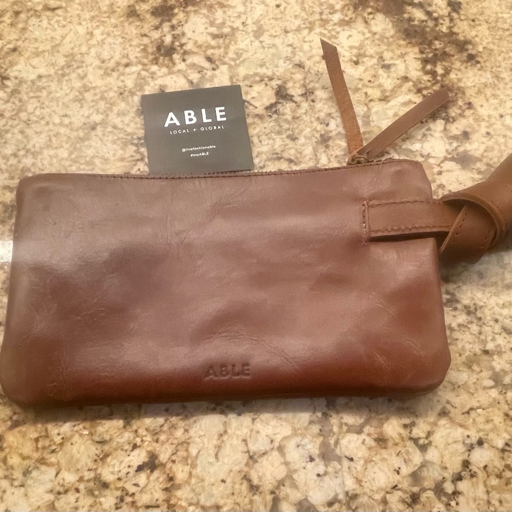 Boutique Item. Able Rachel Wristlet brand new with tags still attached. Leather.
